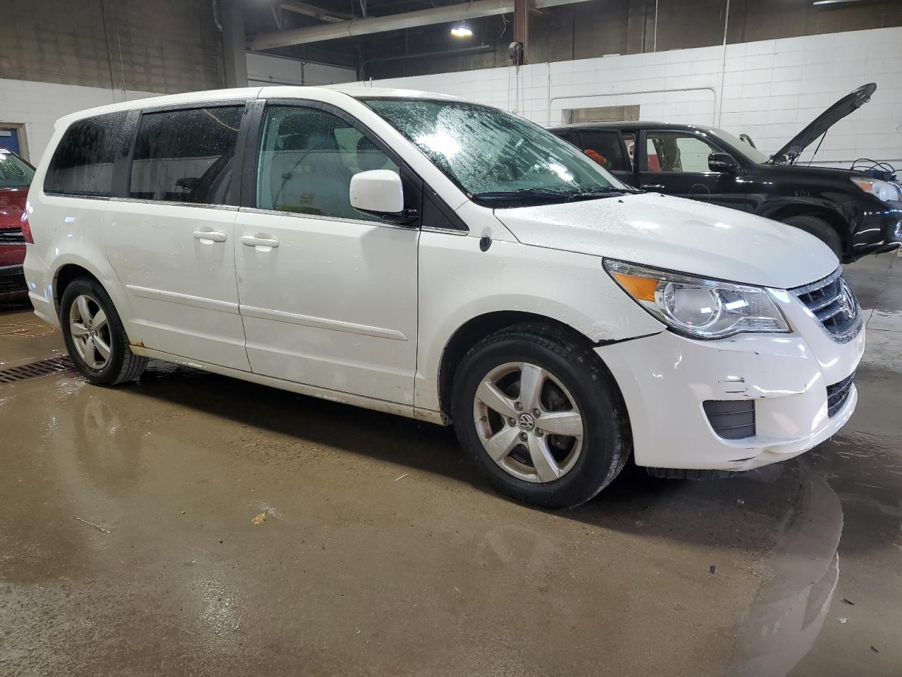 2010 Volkswagen Routan VIN 2V4RW3D11AR236597 Copart auction photo, water/flood damage thumbnail 4