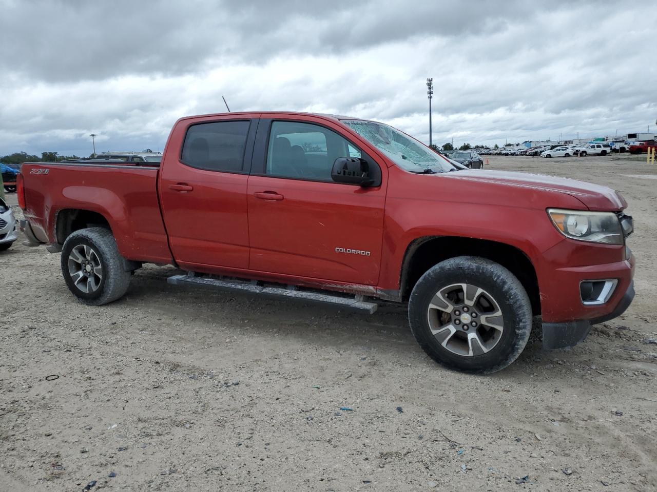 2015 Chevrolet Colorado VIN 1GCGSCE39F1183091 Copart auction photo, minor dent/scratches damage thumbnail 4