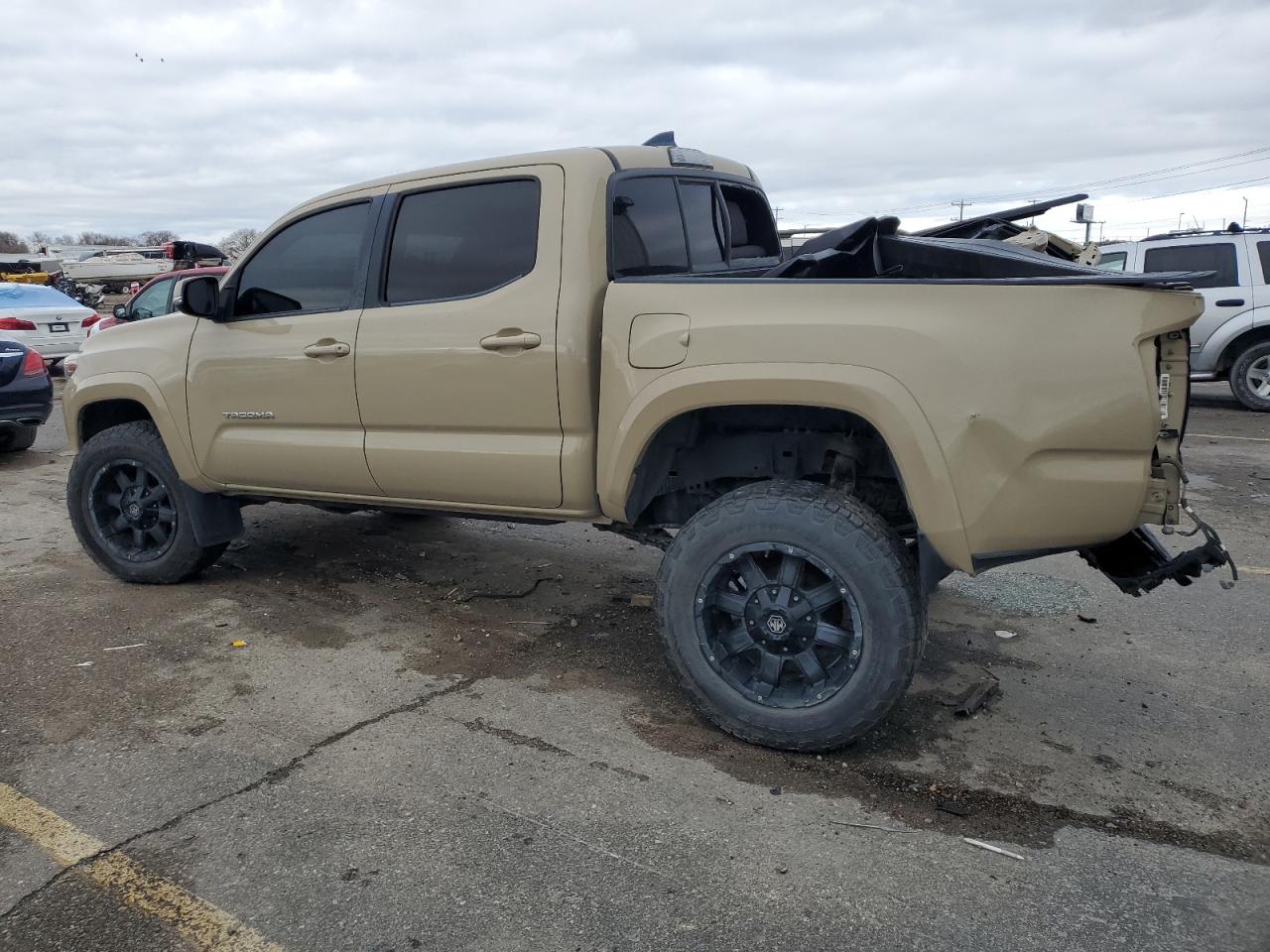 2016 Toyota Tacoma VIN 3TMCZ5AN8GM037010 Copart auction photo, all over damage thumbnail 2