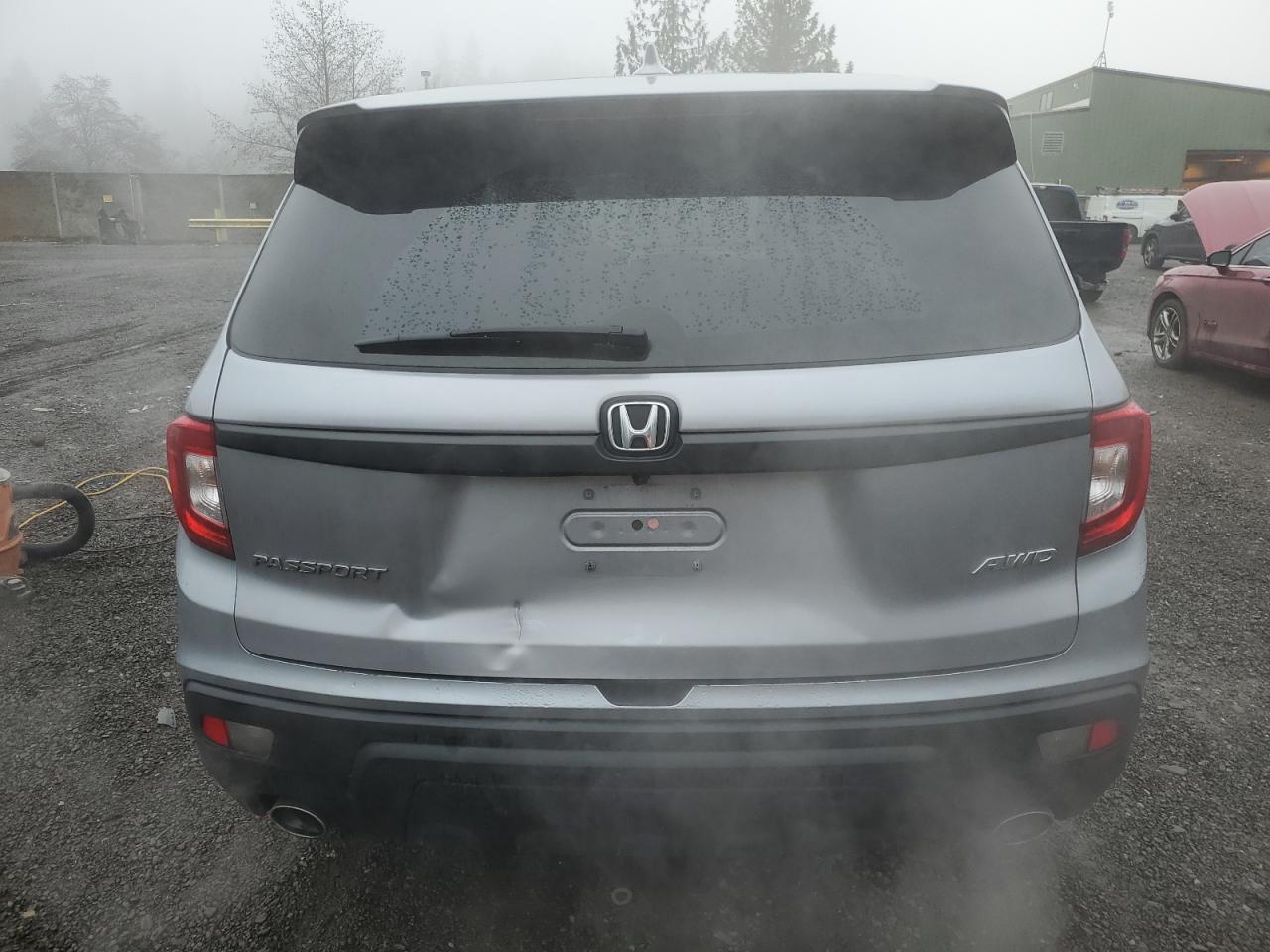 2021 Honda Passport VIN 5FNYF8H53MB040564 Copart auction photo, side / rear end damage thumbnail 6