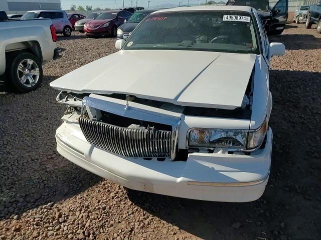 1997 Lincoln Town Car VIN 1LNLM81W4VY679407 Copart auction photo, front end / side damage thumbnail 10
