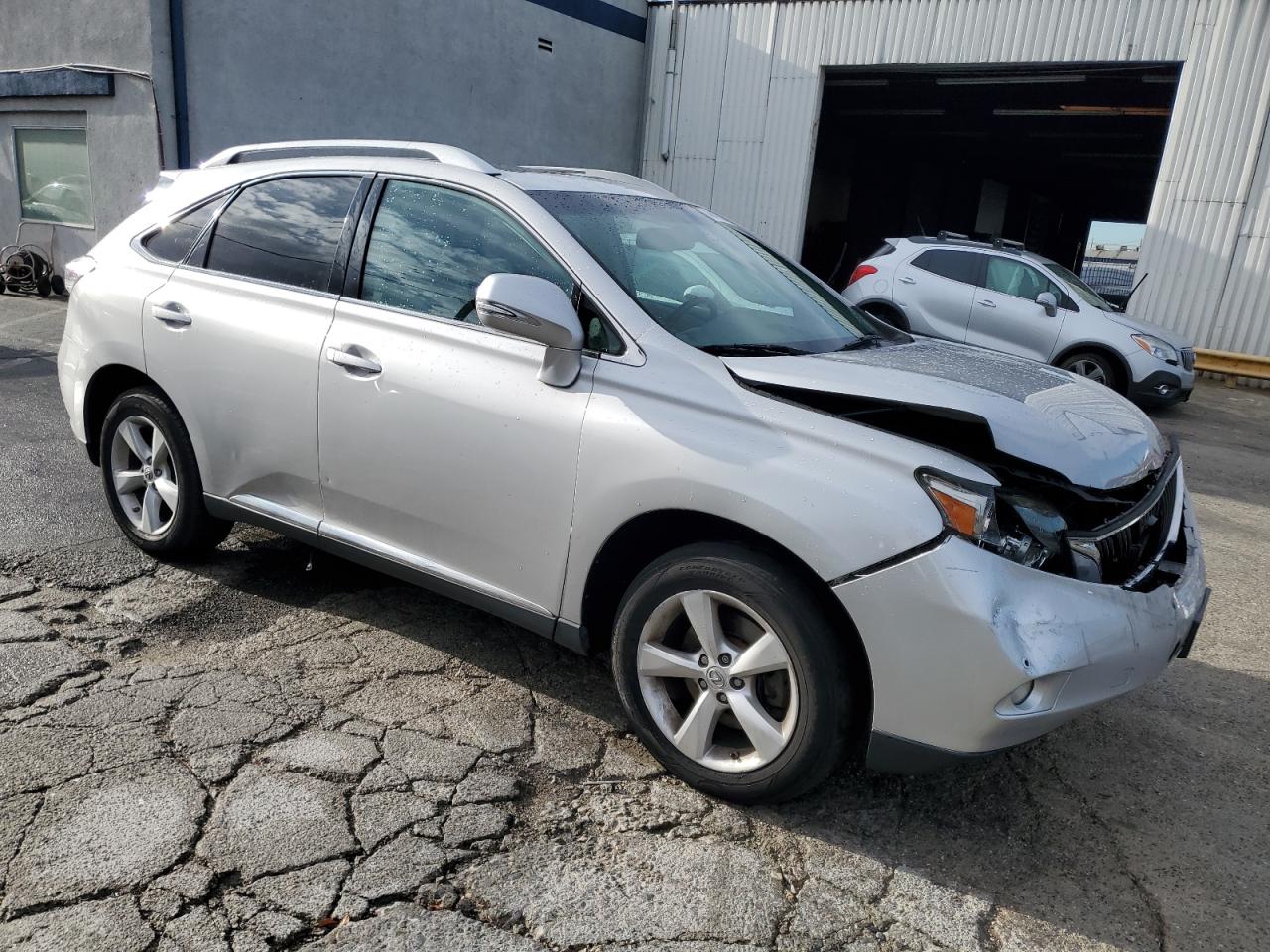 2011 Lexus RX VIN 2T2BK1BA9BC116171 Copart auction photo, front end / side damage thumbnail 4