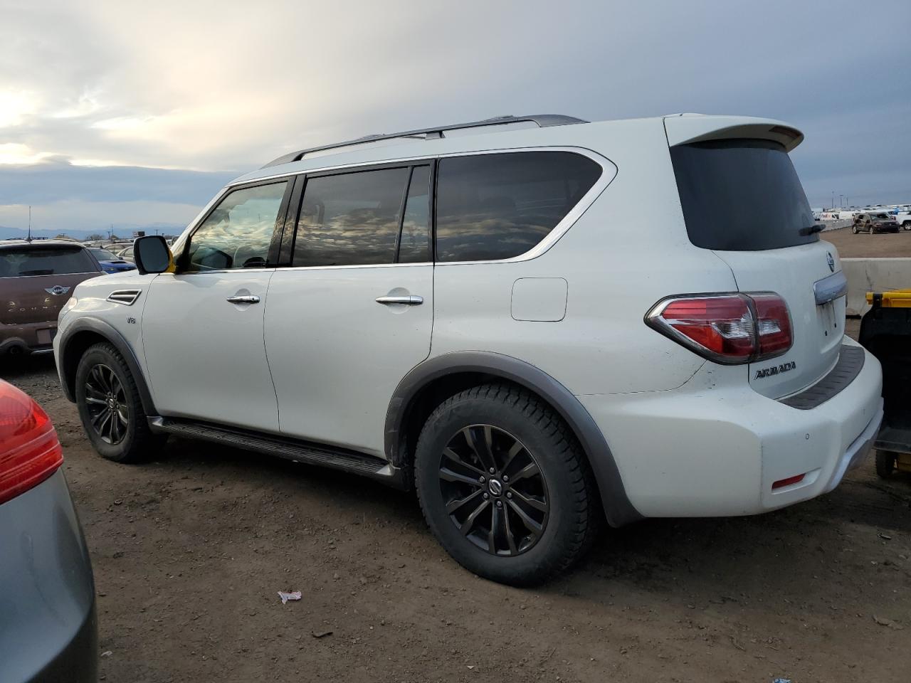 2017 Nissan Armada VIN JN8AY2NE4H9706607 Copart auction photo, minor dent/scratches damage thumbnail 2