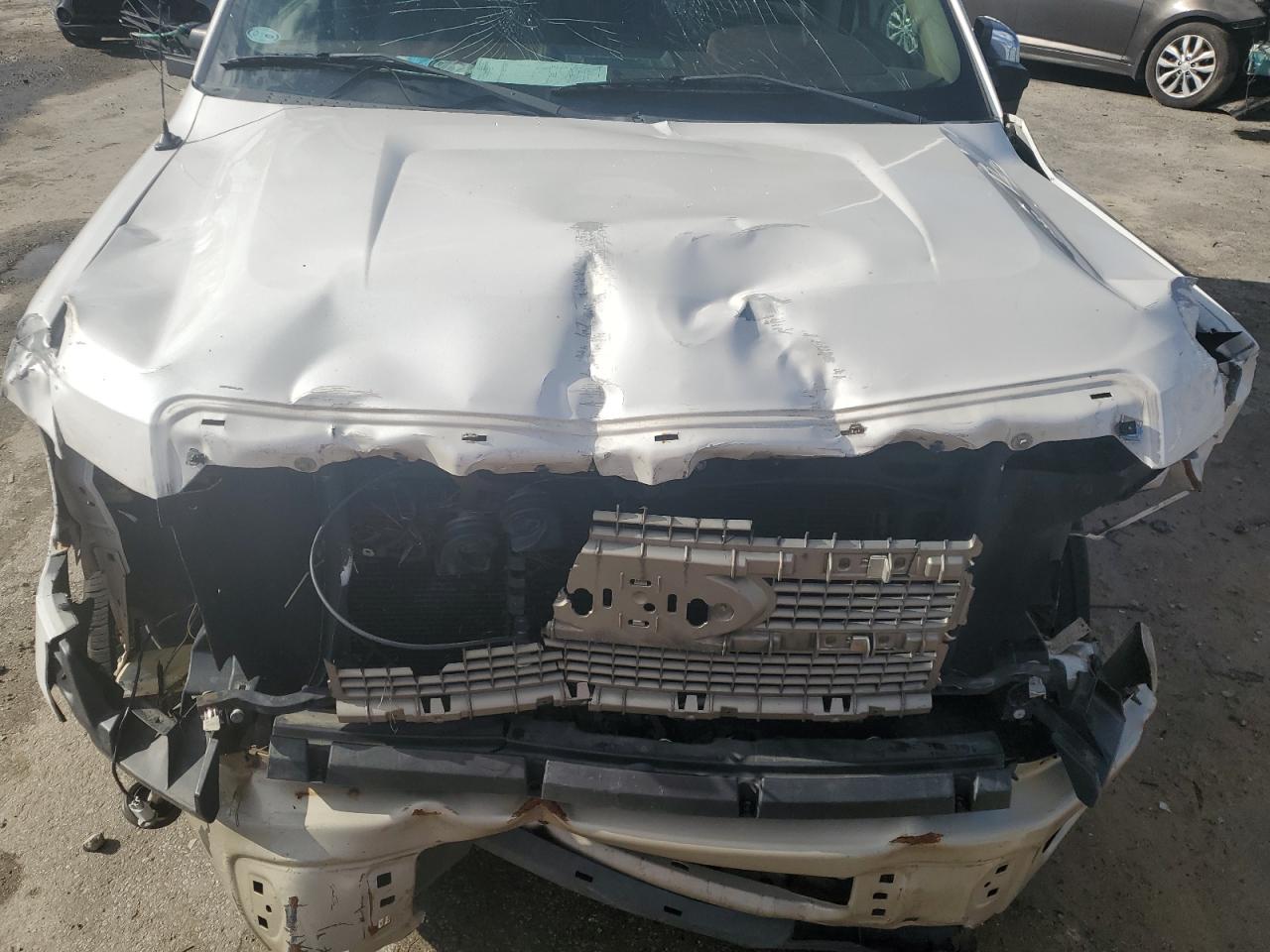 2010 Ford F-150 VIN 1FTFW1CV4AKE12983 Copart auction photo, front end / side damage thumbnail 11