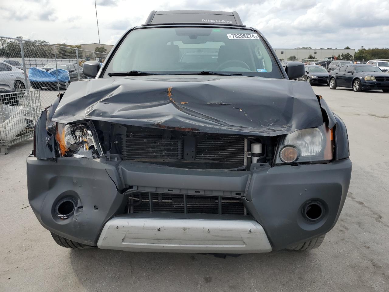 2013 Nissan XTerra VIN 5N1AN0NU3DN819770 Copart auction photo, front end / side damage thumbnail 5