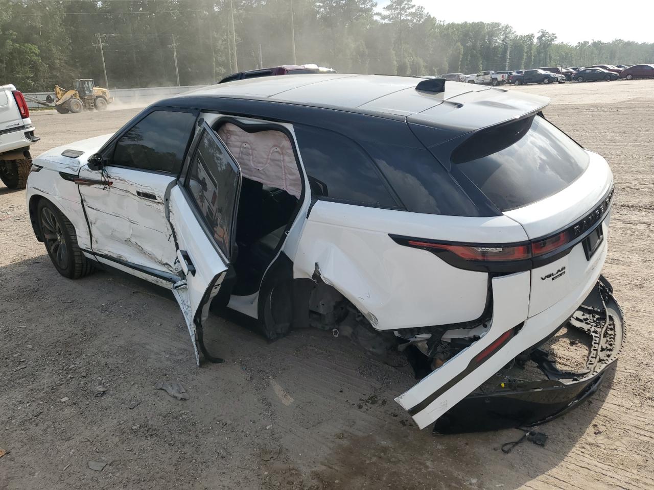 2018 Land Rover Range Rover VIN SALYL2RX5JA710909 Copart auction photo, side / rear end damage thumbnail 2