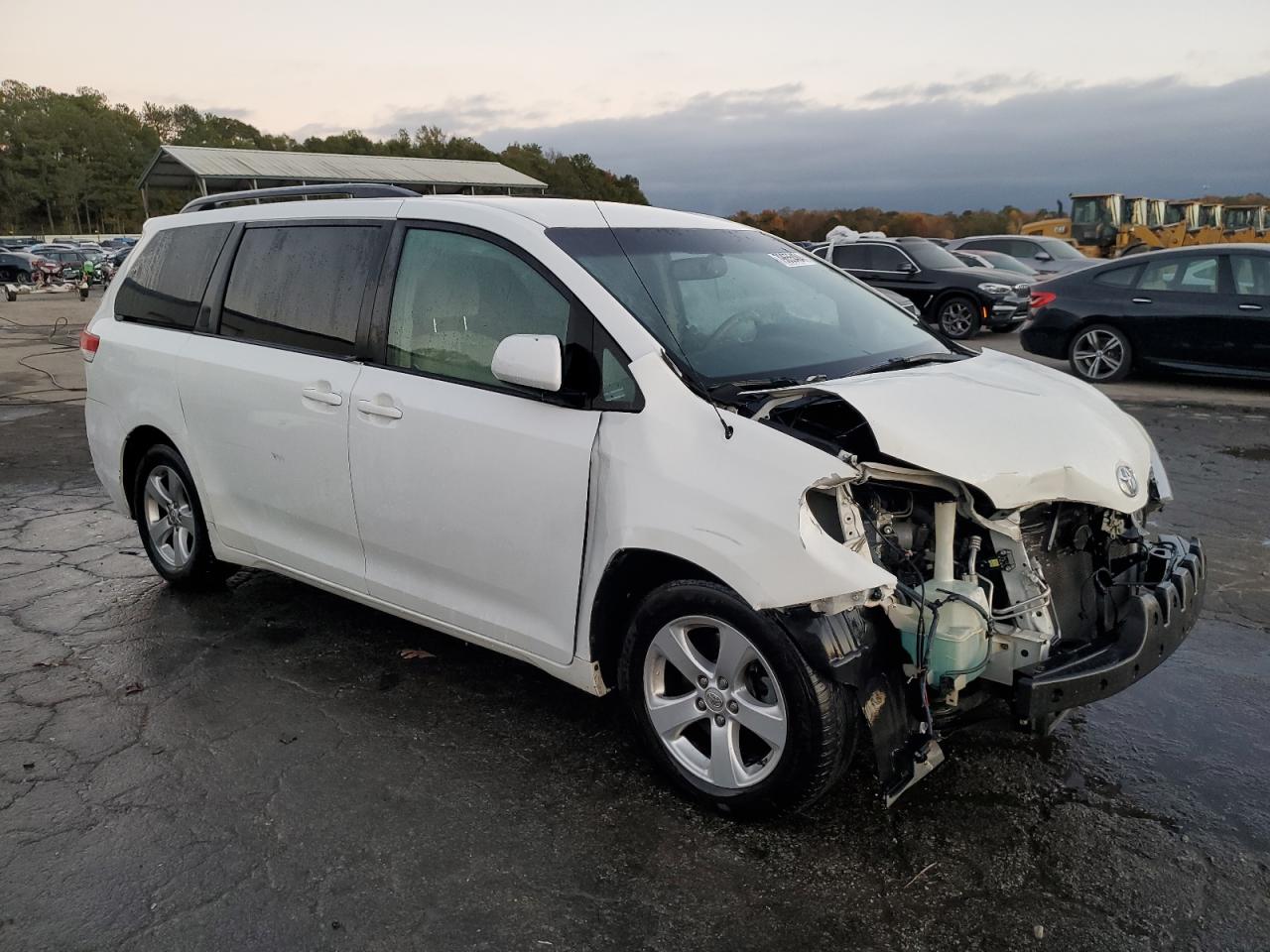 2014 Toyota Sienna VIN 5TDKK3DC9ES442756 Copart auction photo, all over damage thumbnail 4