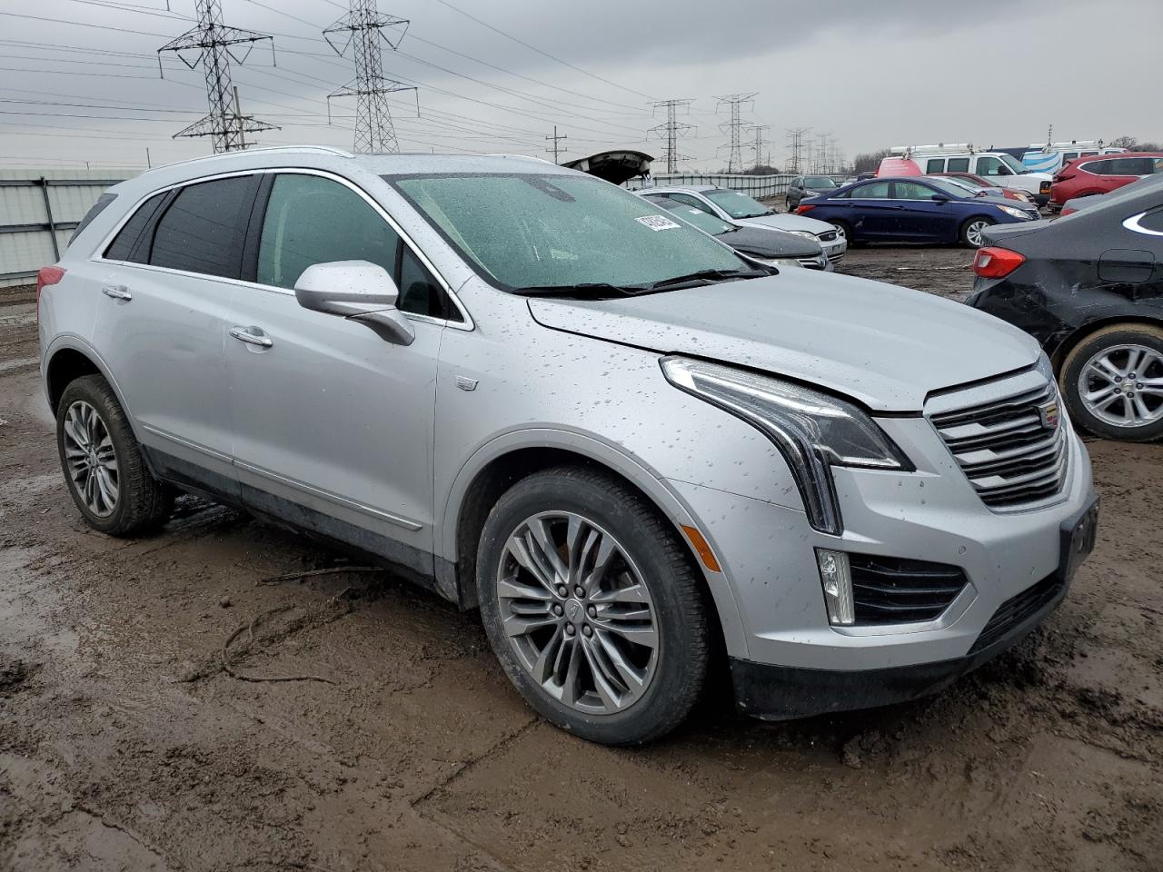 2018 Cadillac XT5 VIN 1GYKNFRS7JZ187777 Copart auction photo, side / front end damage thumbnail 4