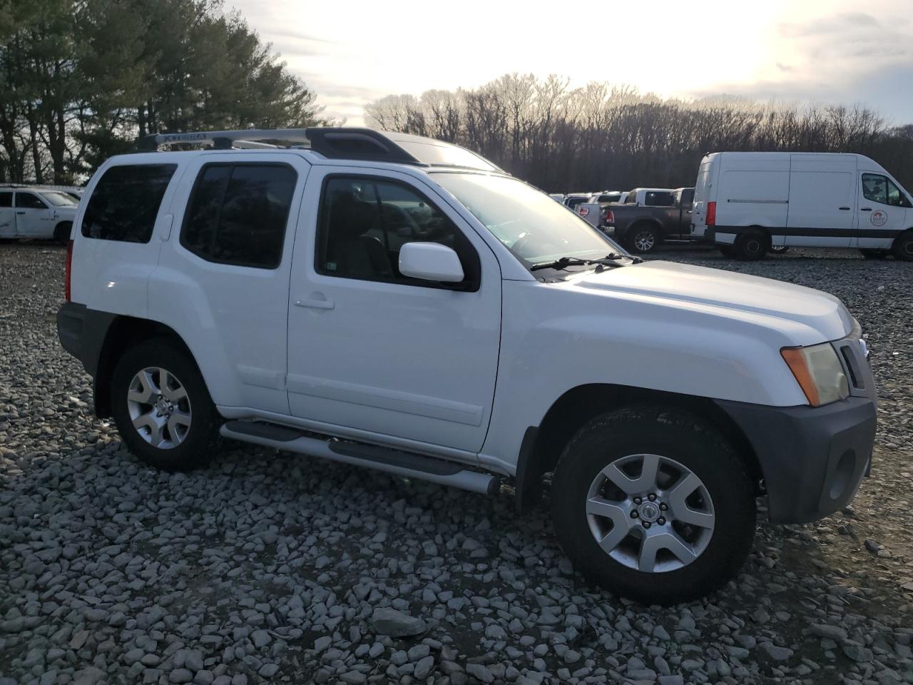 2010 Nissan XTerra VIN 5N1AN0NWXAC502786 Copart auction photo, front end / side damage thumbnail 4