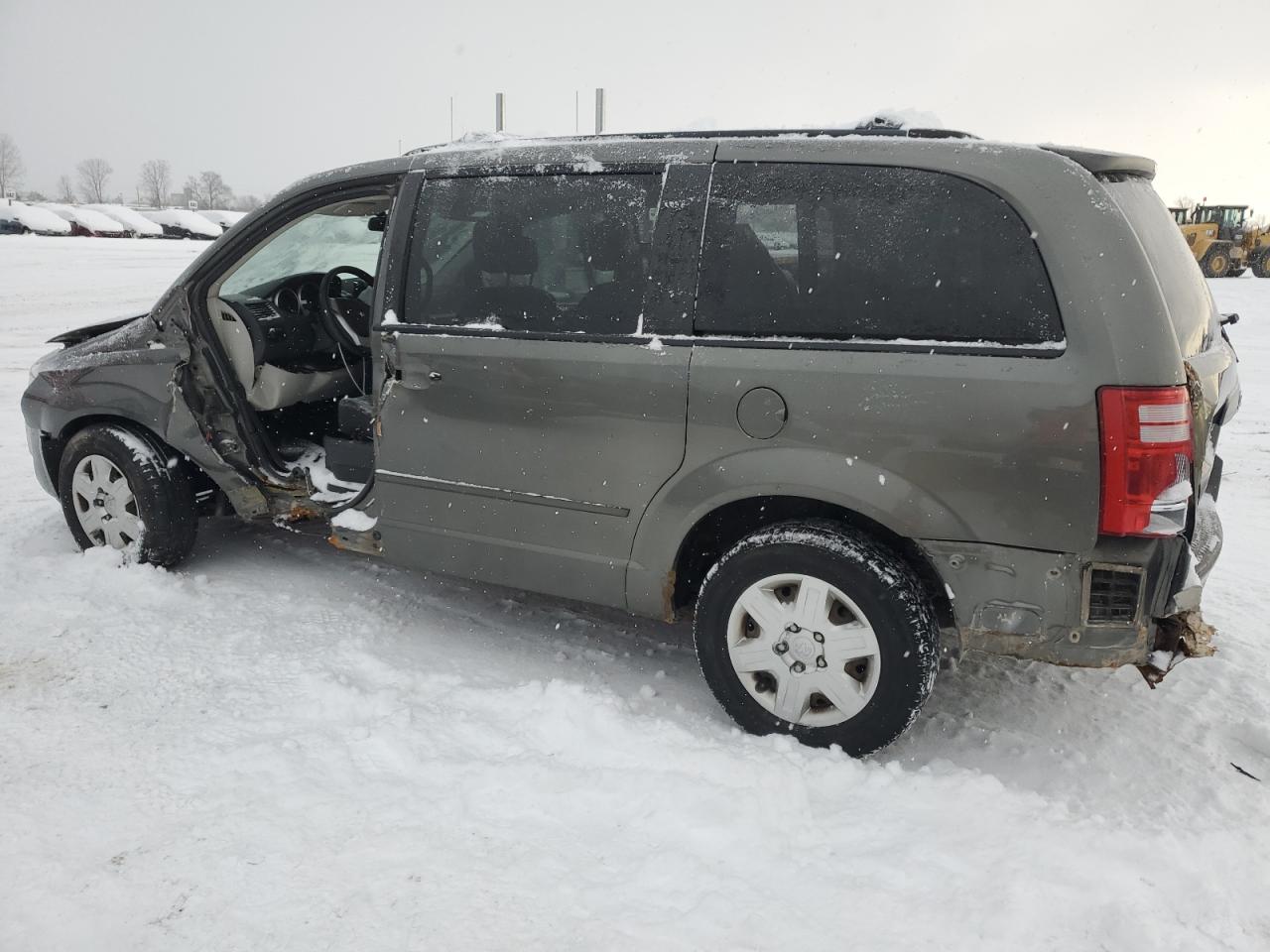 2010 Dodge Caravan VIN 2D4RN4DE6AR312968 Copart auction photo, side / front end damage thumbnail 2