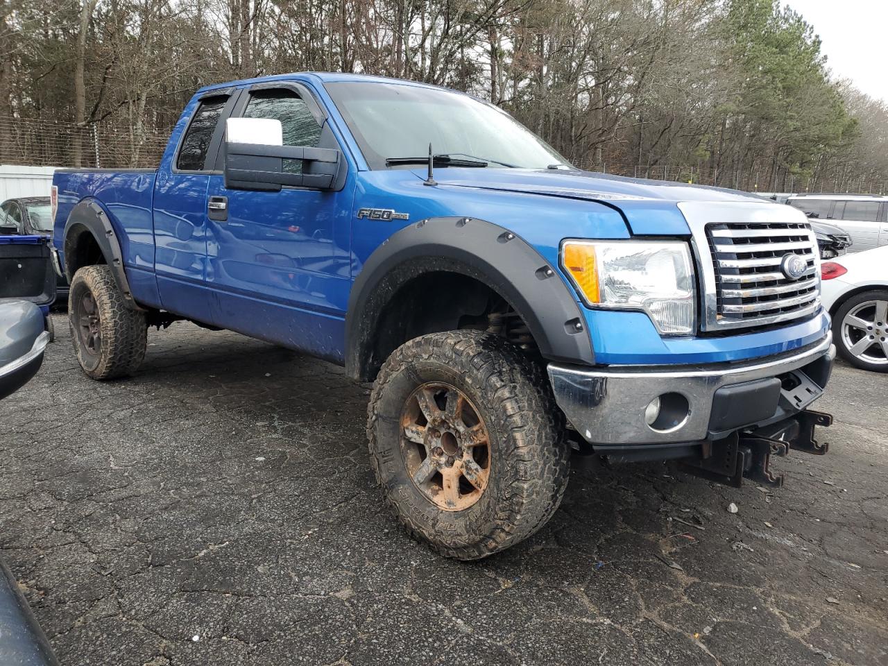 2011 Ford F-150 VIN 1FTFX1EF5BKD25534 Copart auction photo, front end / side damage thumbnail 4