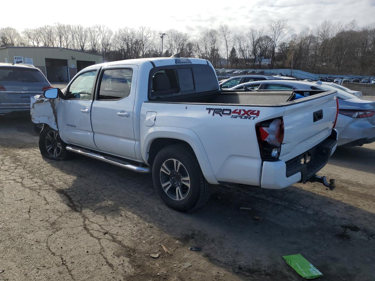 2019 Toyota Tacoma VIN 5TFCZ5ANXKX166403 Copart auction photo, all over damage thumbnail 2