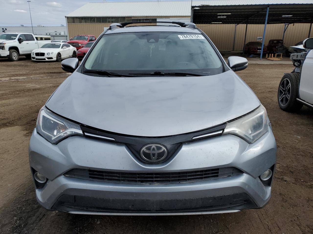 2018 Toyota RAV 4 VIN 2T3RFREV2JW800066 Copart auction photo, side / front end damage thumbnail 5