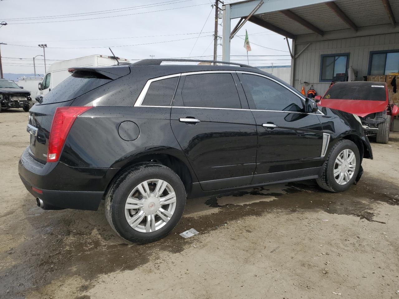 2016 Cadillac SRX VIN 3GYFNAE32GS582586 Copart auction photo, front end damage thumbnail 3