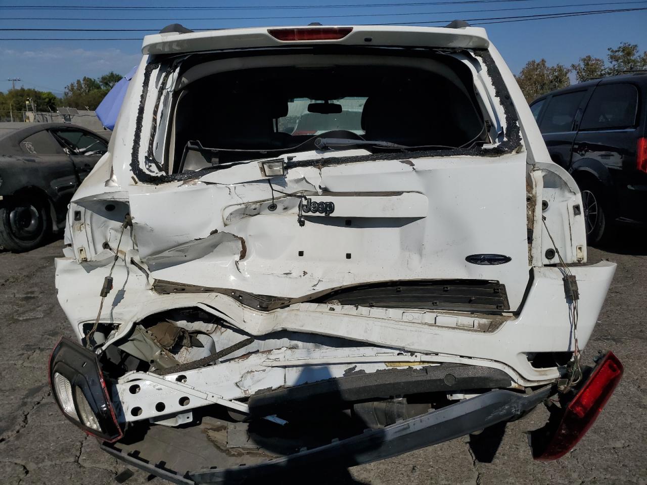 2014 Jeep Compass VIN 1C4NJCEA8ED680669 Copart auction photo, rear end damage thumbnail 6