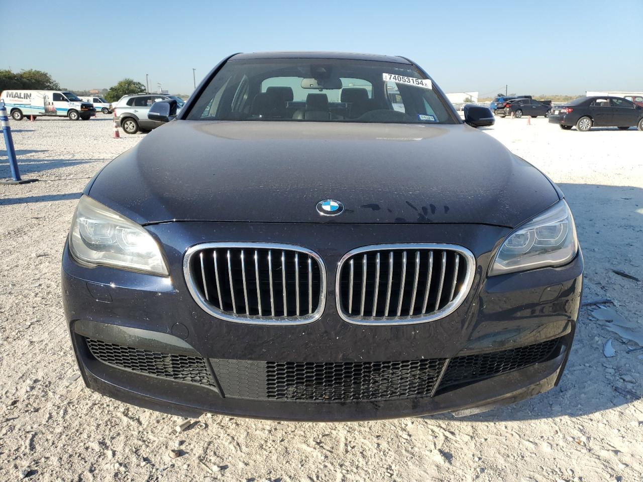 2015 BMW 7er VIN WBAYE8C59FD781318 Copart auction photo, side / minor dent/scratches damage thumbnail 5