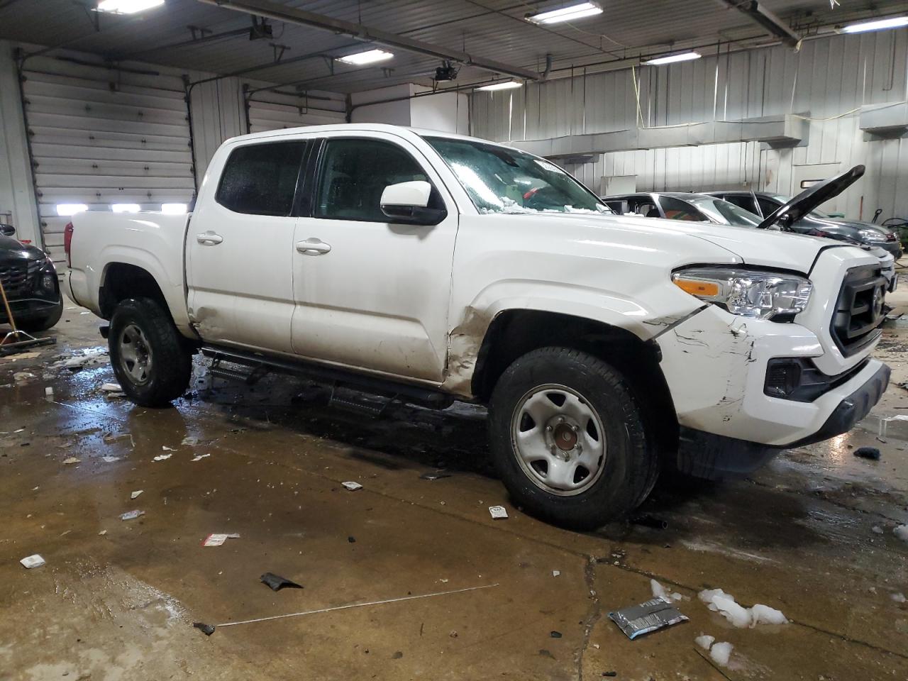 2022 Toyota Tacoma VIN 3TYAX5GN1NT057511 Copart auction photo, all over damage thumbnail 4