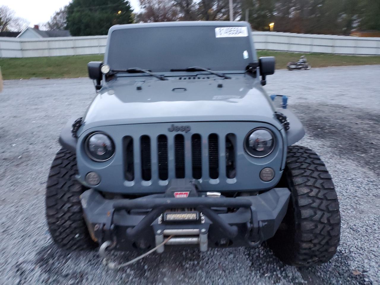 2014 Jeep Wrangler VIN 1C4BJWDG8EL176896 Copart auction photo, front end damage thumbnail 5