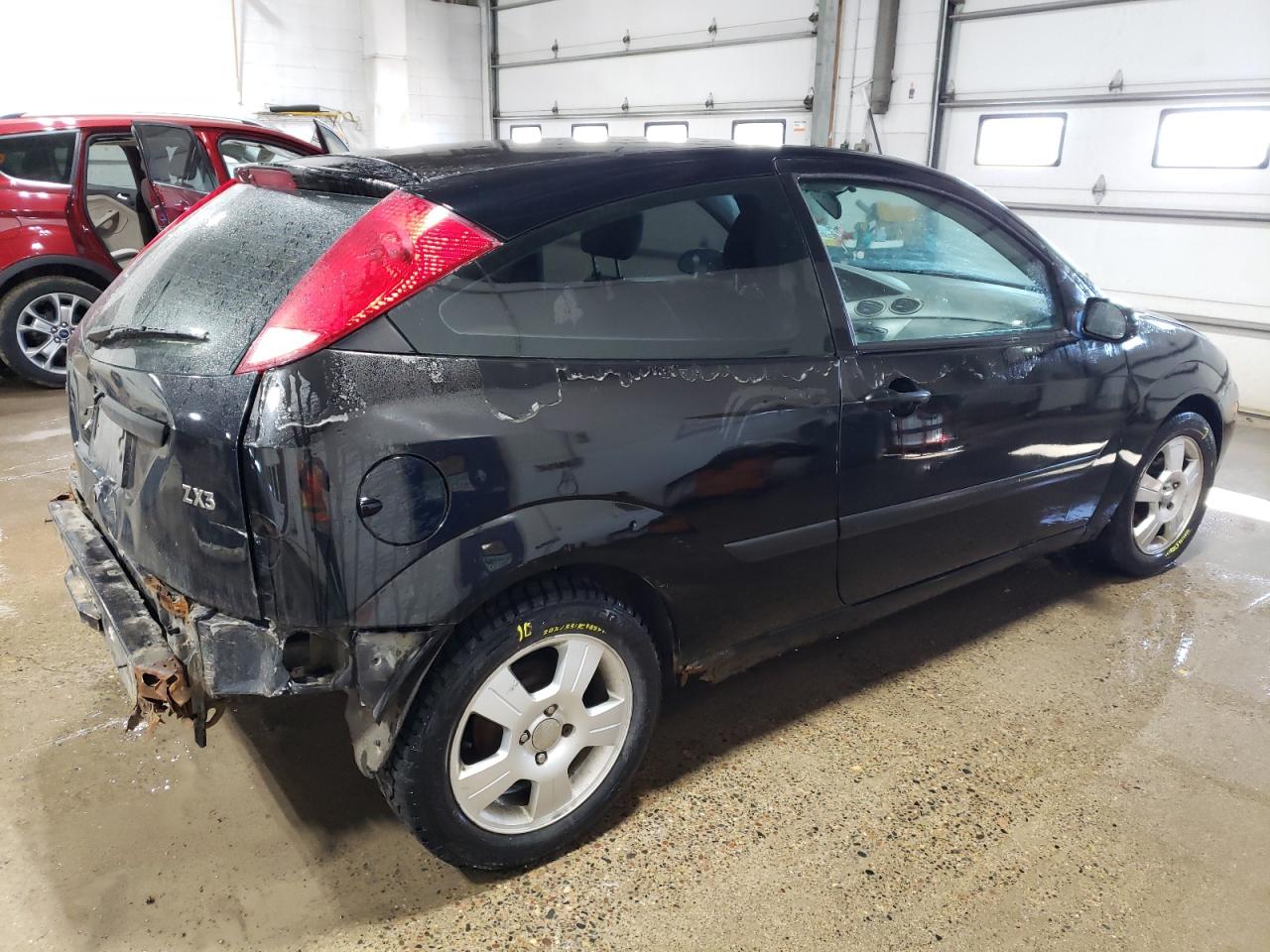 2004 Ford Focus VIN 3FAFP31Z44R117869 Copart auction photo, rear end / side damage thumbnail 3