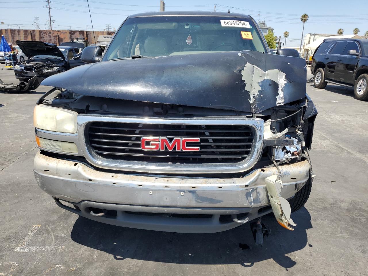 2002 GMC Yukon VIN 1GKEC16T12J146154 Copart auction photo, front end / minor dent/scratches damage thumbnail 5