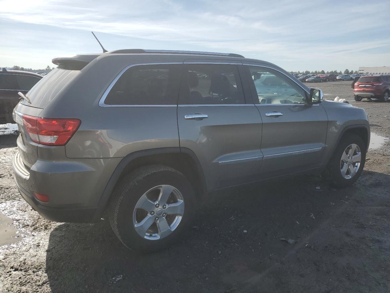 2011 Jeep Grand Cherokee VIN 1J4RR5GG9BC668954 Copart auction photo, side damage thumbnail 3