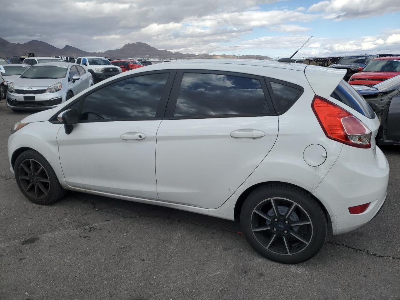 2015 Ford Fiesta VIN 3FADP4EJ6FM149269 Copart auction photo, front end / side damage thumbnail 2