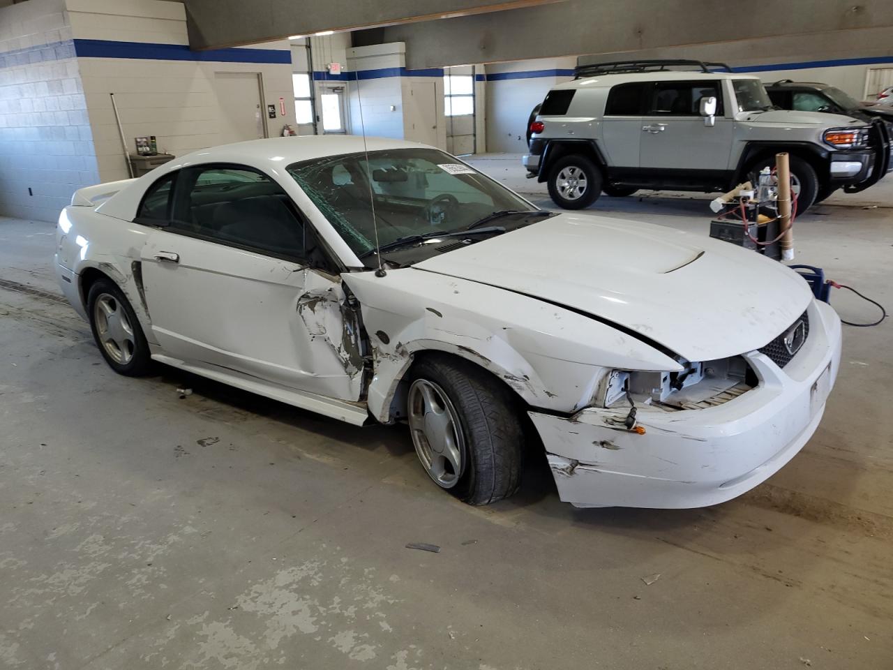 2004 Ford Mustang VIN 1FAFP40674F152836 Copart auction photo, side / undercarriage damage thumbnail 4