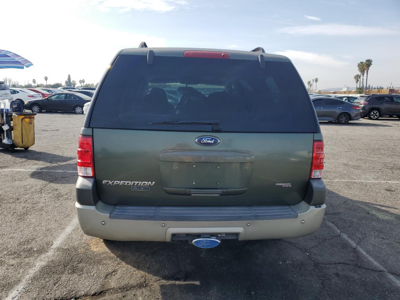 2006 Ford Expedition VIN 1FMFU18536LA08889 Copart auction photo, front end / minor dent/scratches damage thumbnail 6