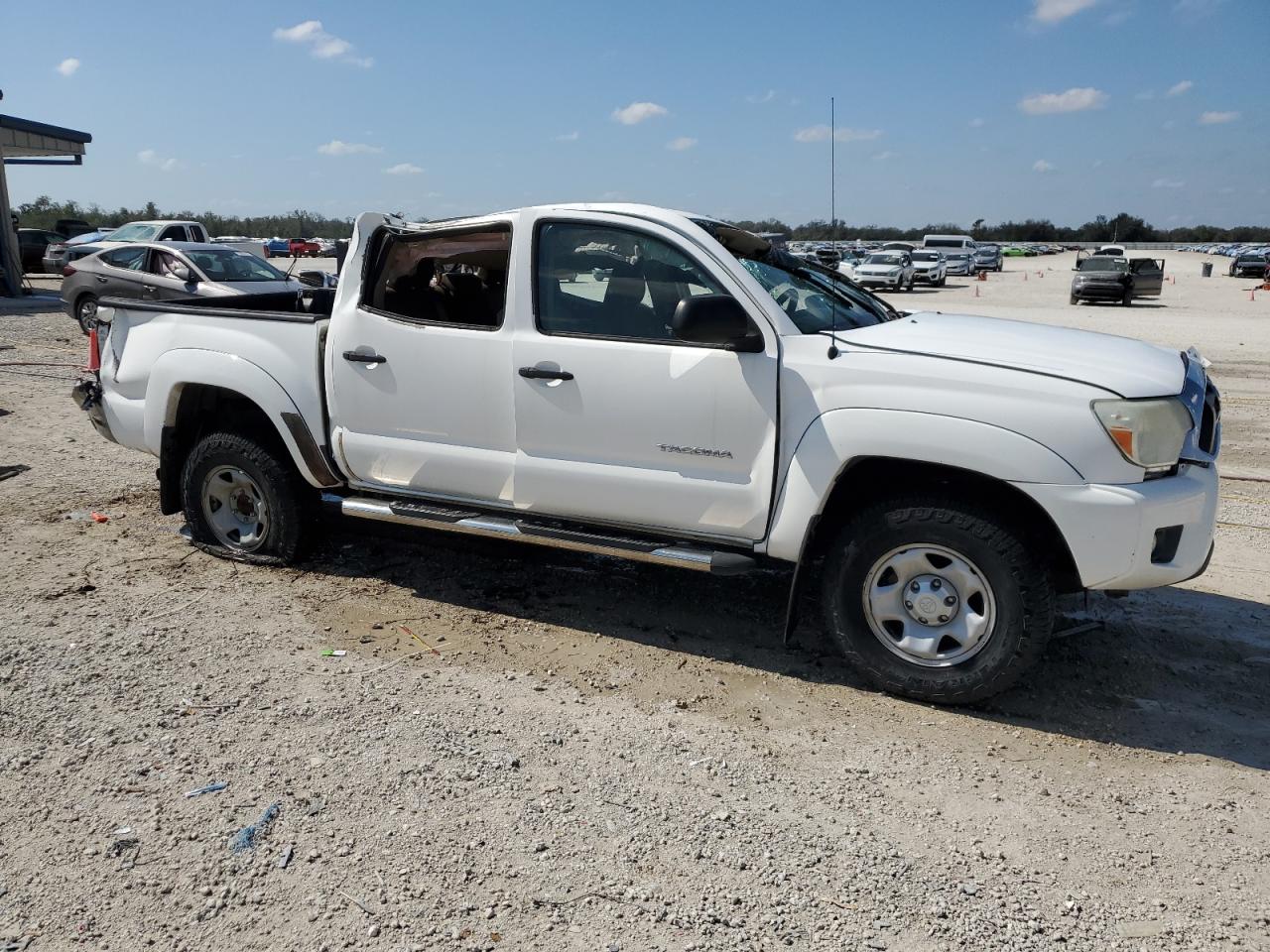 2015 Toyota Tacoma VIN 3TMJU4GN6FM193830 Copart auction photo, rollover damage thumbnail 4