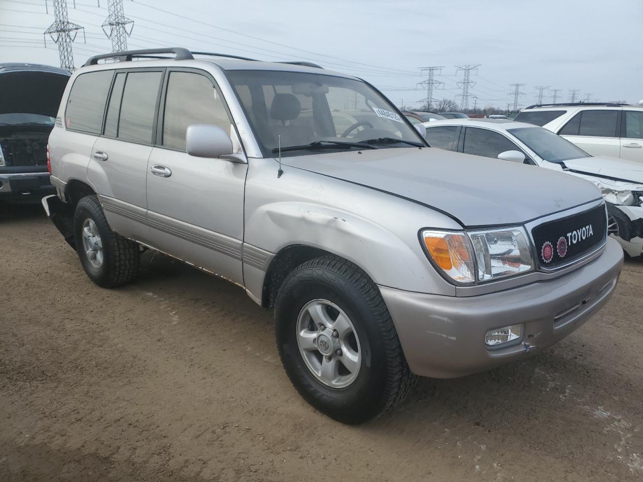 1999 Toyota Land Cruiser VIN JT3HT05JXX0040466 Copart auction photo, rear end / front end damage thumbnail 4