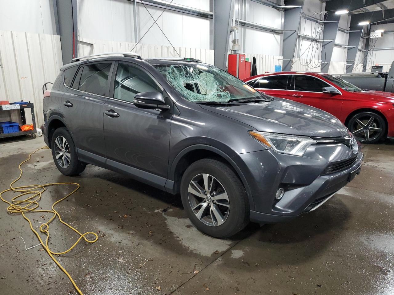 2016 Toyota RAV 4 VIN 2T3RFREV8GW463668 Copart auction photo, all over damage thumbnail 4