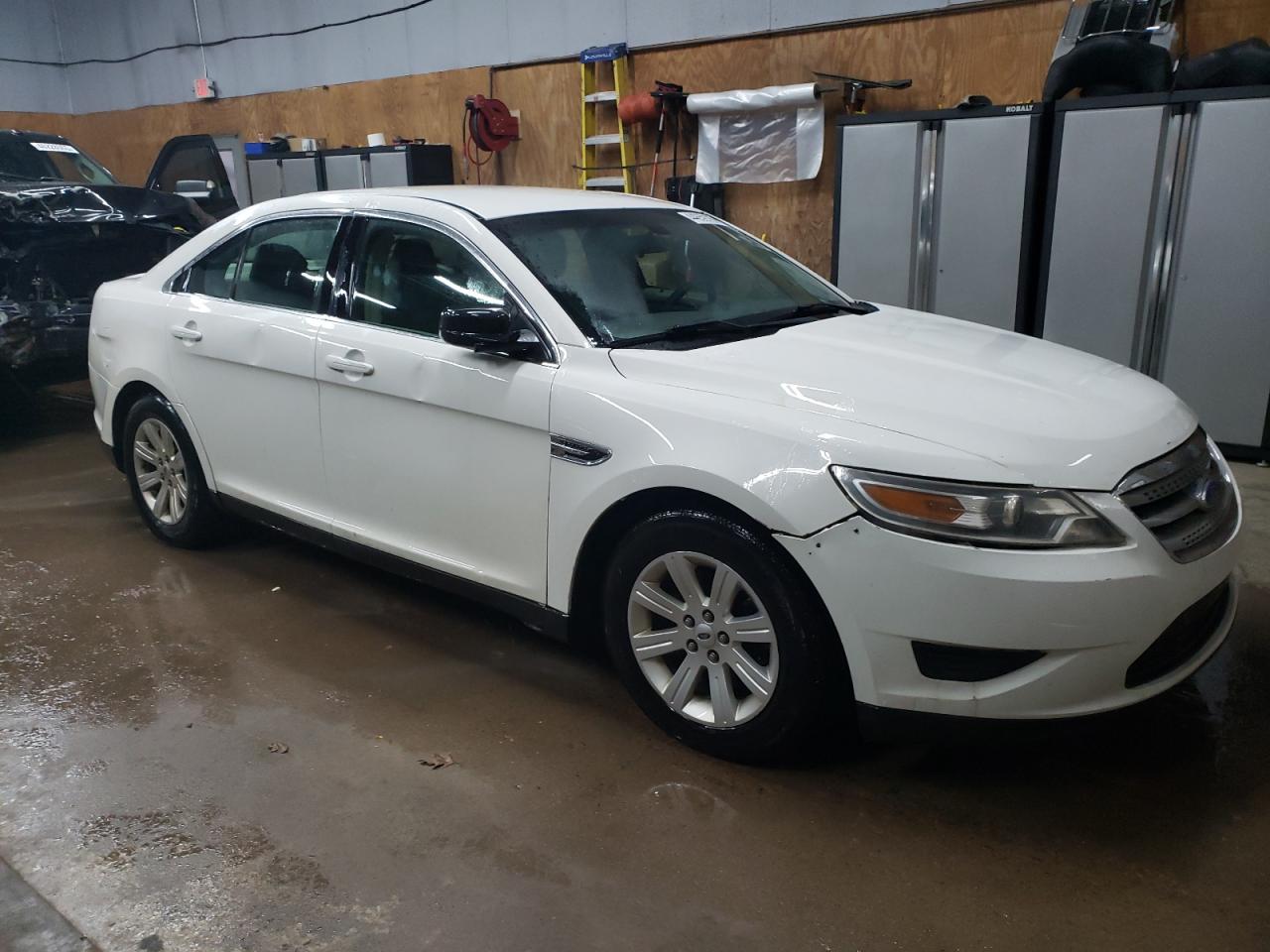 2011 Ford Taurus VIN 1FAHP2DW1BG185698 Copart auction photo, rear end / minor dent/scratches damage thumbnail 4