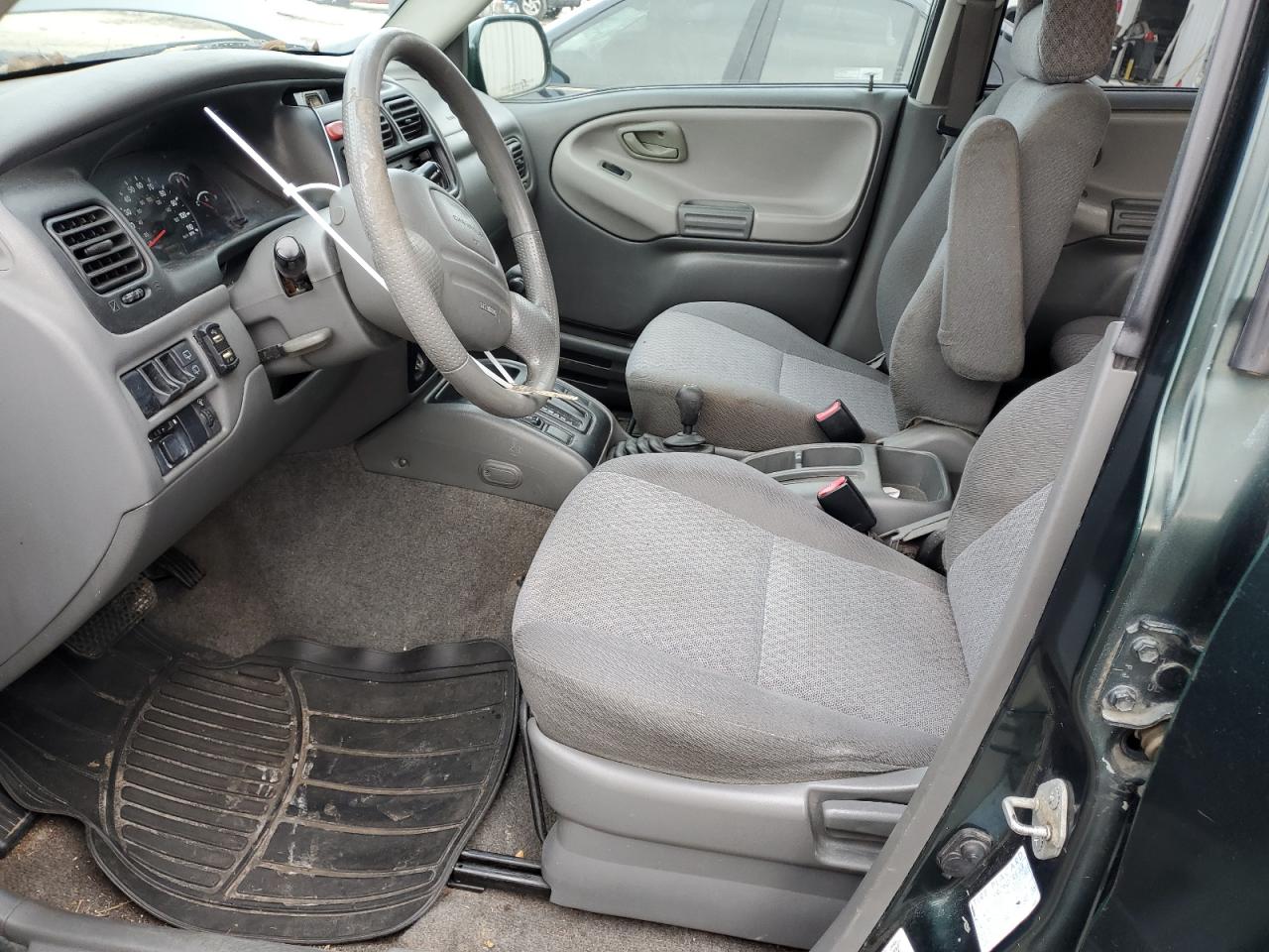 2003 Chevrolet Tracker VIN 2CNBJ13CX36949435 Copart auction photo, front end / mechanical damage thumbnail 7