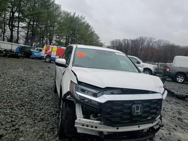 2023 Honda Passport VIN 5FNYF8H59PB041173 Copart auction photo, front end damage thumbnail 11