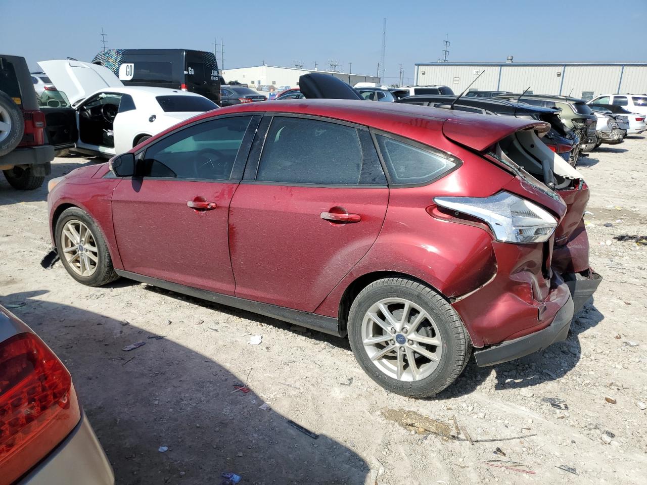 2015 Ford Focus VIN 1FADP3K27FL384613 Copart auction photo, rear end / front end damage thumbnail 2
