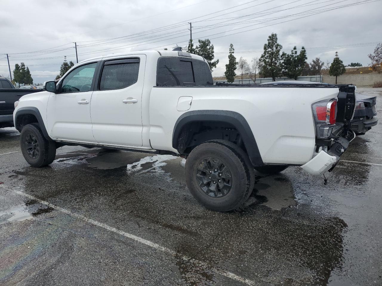 2021 Toyota Tacoma VIN 3TMDZ5BN0MM114807 Copart auction photo, rear end damage thumbnail 2