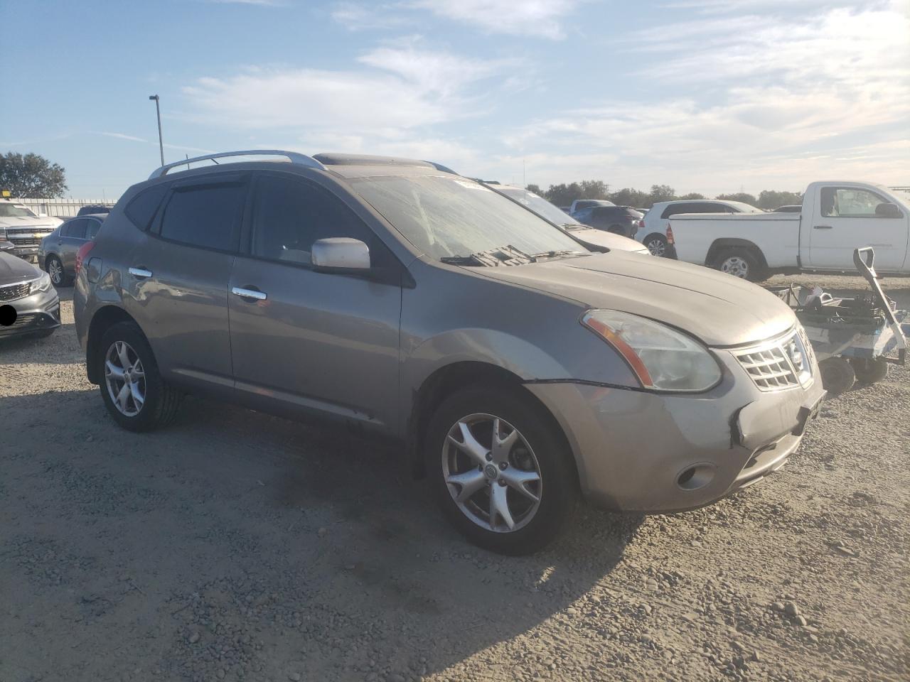 2010 Nissan Rogue VIN JN8AS5MT0AW500212 Copart auction photo, vandalism damage thumbnail 4