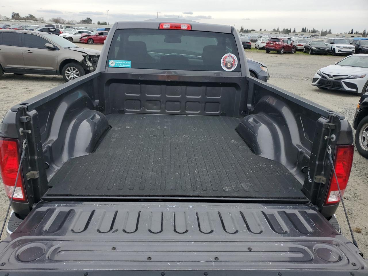 2015 RAM 1500 VIN 3C6JR6AT2FG699259 Copart auction photo, all over damage thumbnail 10