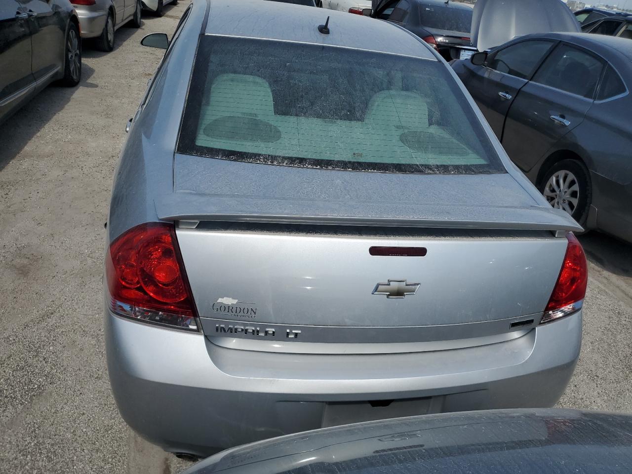 2012 Chevrolet Impala VIN 2G1WB5E32C1181897 Copart auction photo, water/flood / minor dent/scratches damage thumbnail 6