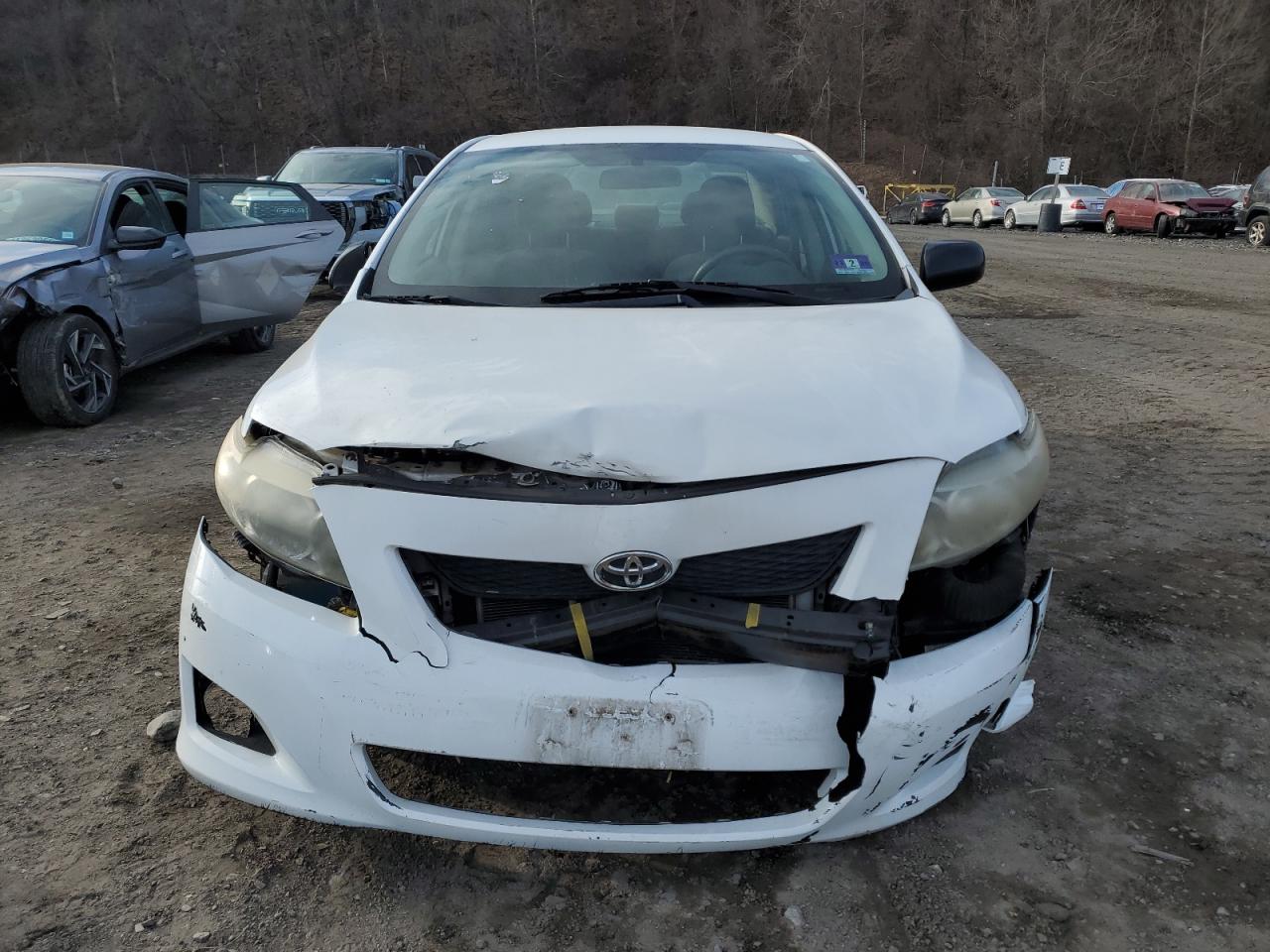 2009 Toyota Corolla VIN 1NXBU40EX9Z100480 Copart auction photo, front end damage thumbnail 5