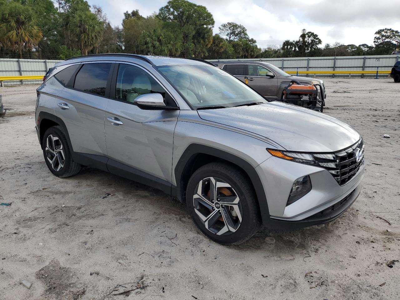 2023 Hyundai Tucson VIN 5NMJFCAE6PH265935 Copart auction photo, side / minor dent/scratches damage thumbnail 4