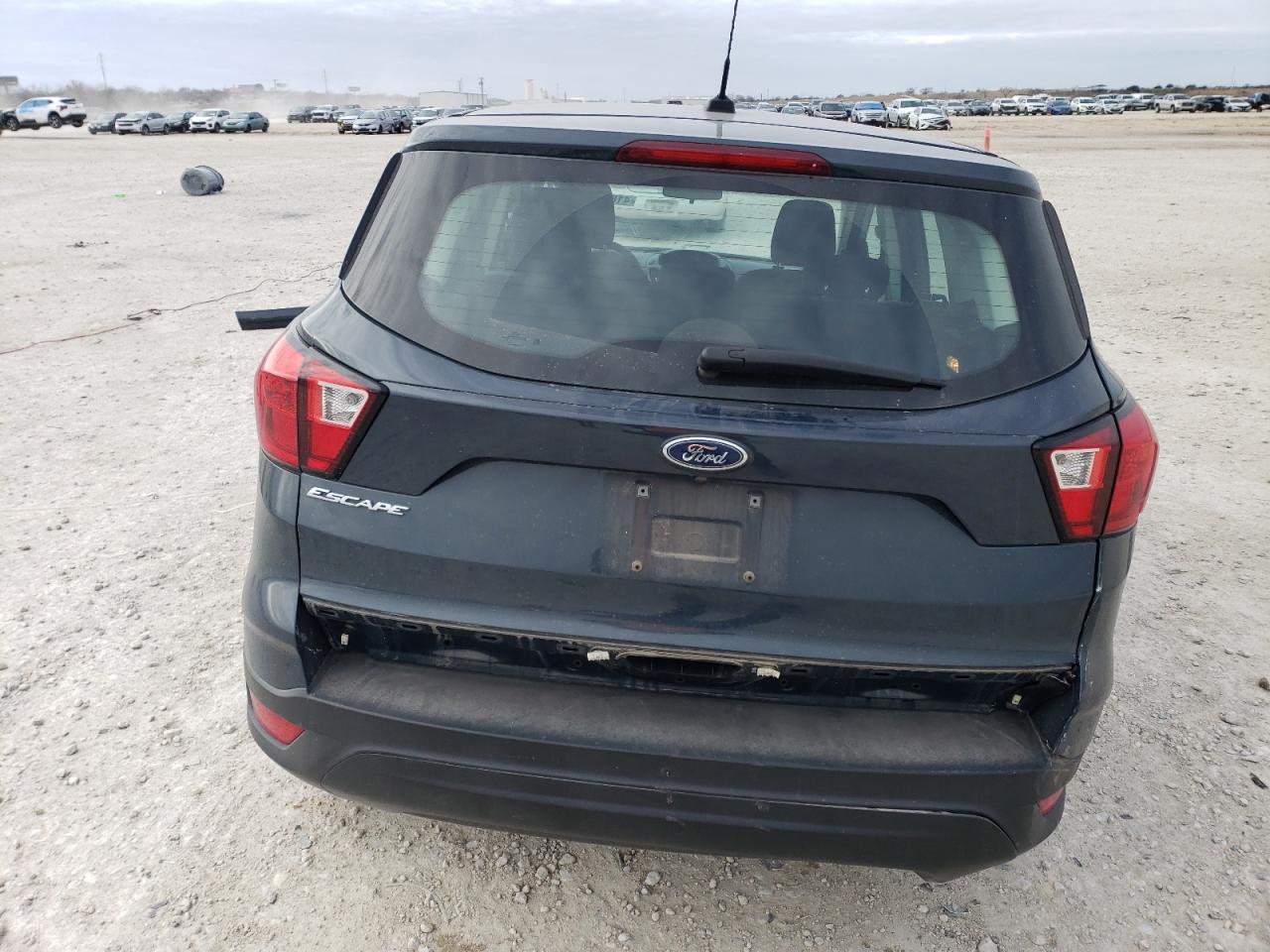 2019 Ford Escape VIN 1FMCU0F72KUB00243 Copart auction photo, all over damage thumbnail 6