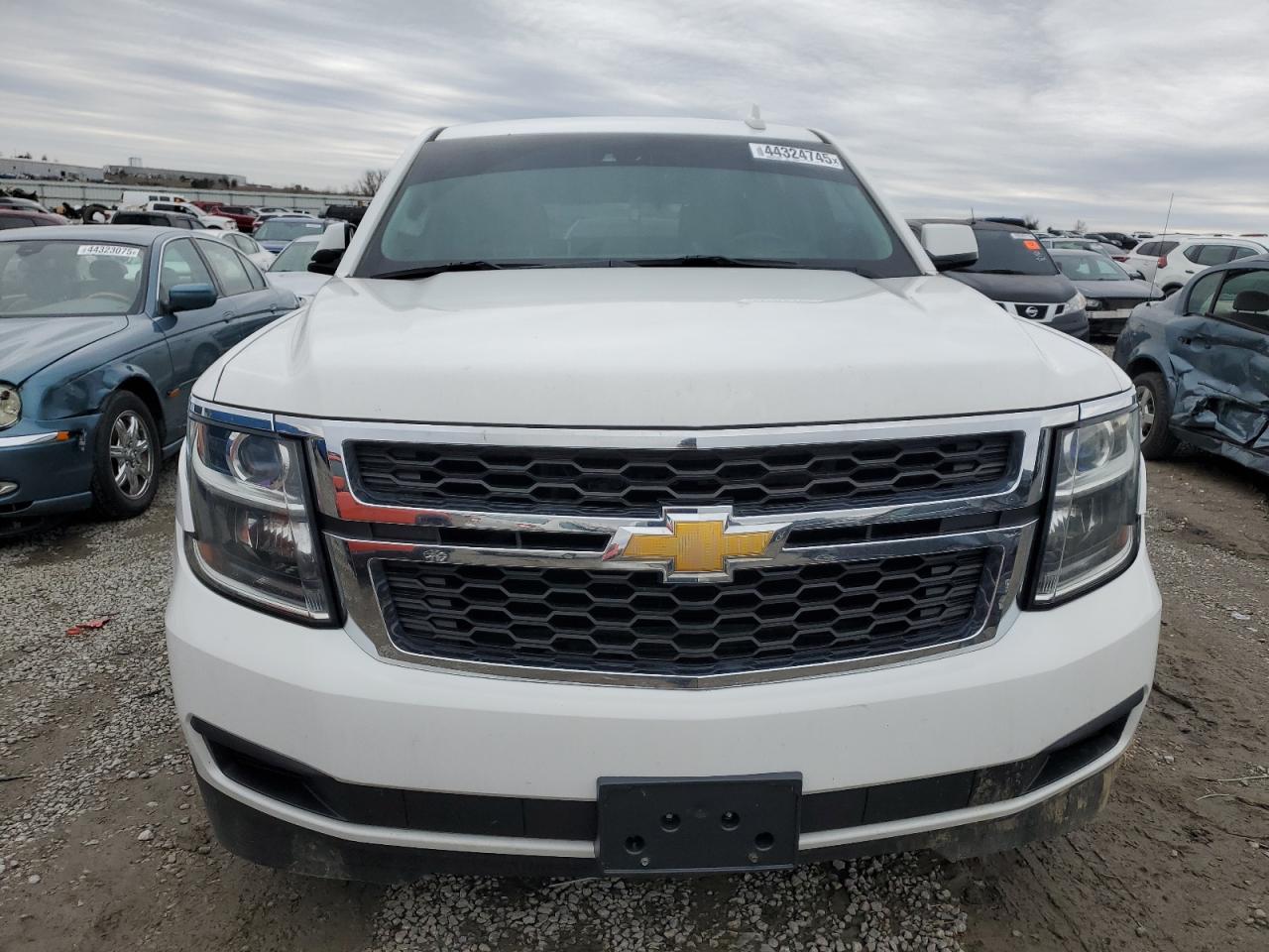 2015 Chevrolet Tahoe VIN 1GNSKBKCXFR561226 Copart auction photo, all over damage thumbnail 5