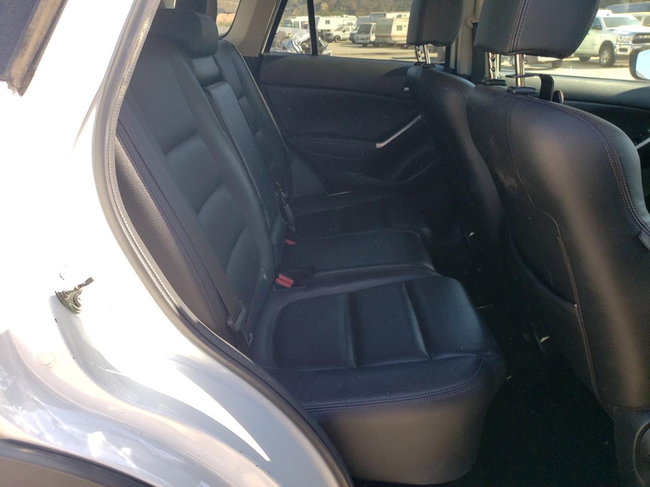 2016 Mazda CX-5 VIN JM3KE2DYXG0729064 Copart auction photo, side damage thumbnail 12