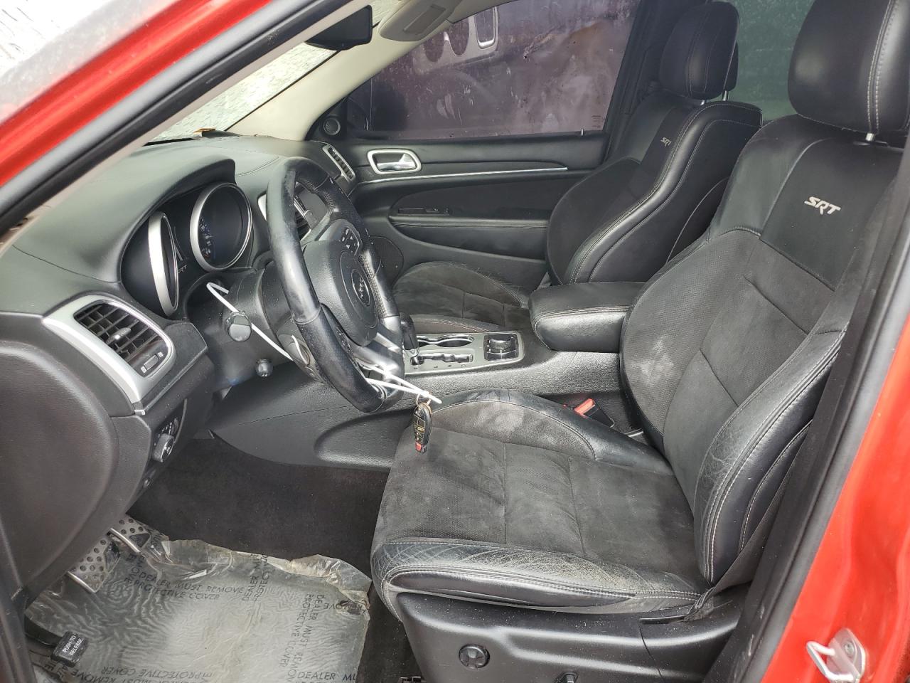2012 Jeep Grand Cherokee VIN 1C4RJFDJ7CC217641 Copart auction photo, burn damage thumbnail 7