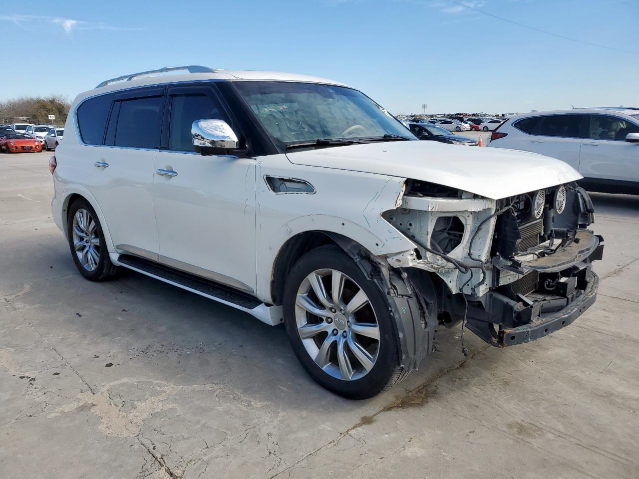 2011 Infiniti QX56 VIN JN8AZ2ND9B9700247 Copart auction photo, front end / side damage thumbnail 4