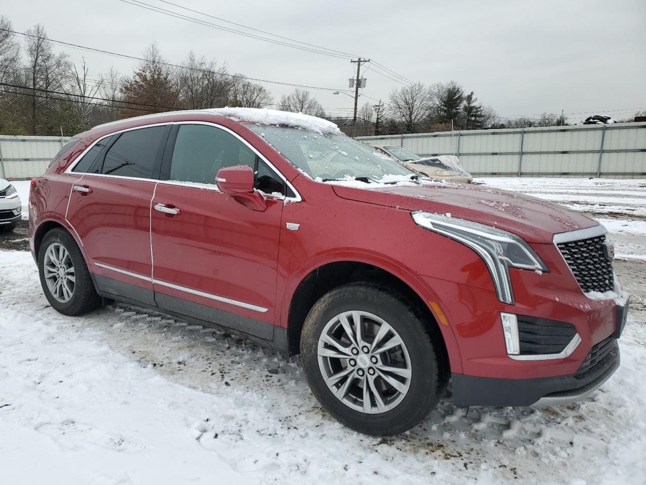 2021 Cadillac XT5 VIN 1GYKNDRS4MZ121759 Copart auction photo, rear end / side damage thumbnail 4