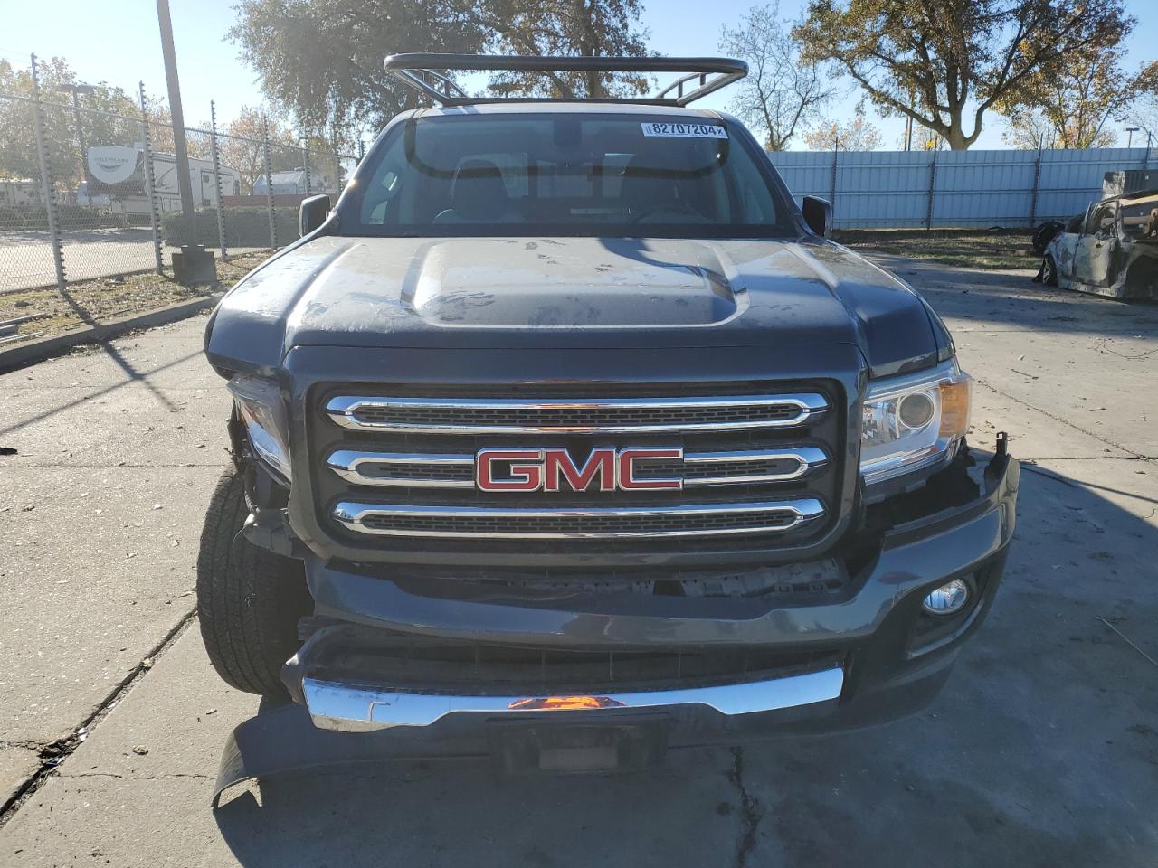 2015 GMC Canyon VIN 1GTG5BE38F1240947 Copart auction photo, front end / side damage thumbnail 5