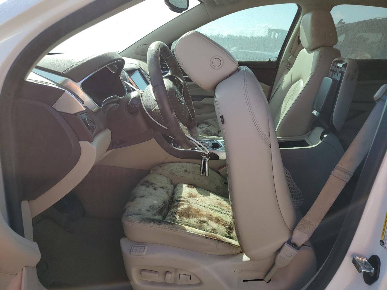 2016 Cadillac SRX VIN 3GYFNDE34GS580145 Copart auction photo, water/flood damage thumbnail 7