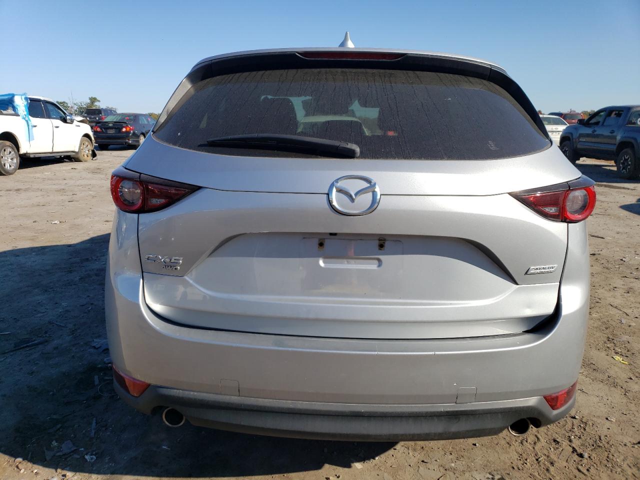 2019 Mazda CX-5 VIN JM3KFBCM5K0667173 Copart auction photo, side / rear end damage thumbnail 6